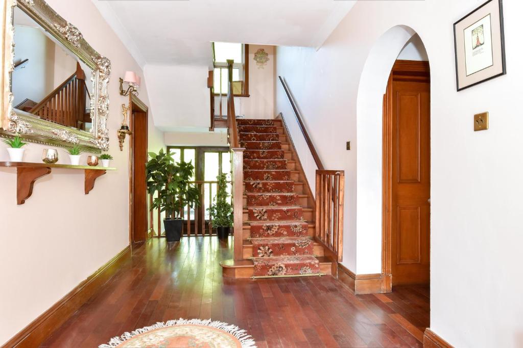 TV a/nebo společenská místnost v ubytování Boutique Guest House
