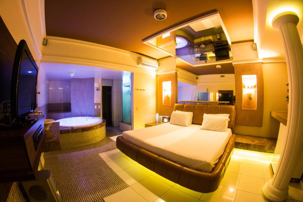 Voodi või voodid majutusasutuse Netuno Motel (Adults Only) toas