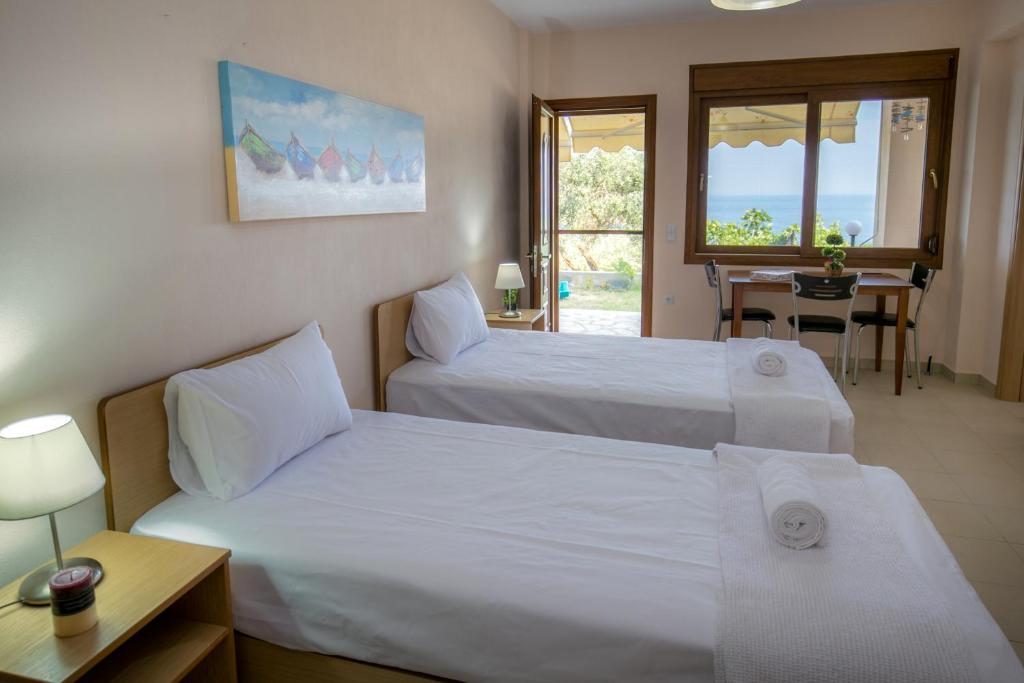 Voodi või voodid majutusasutuse Aphrodite Villas toas