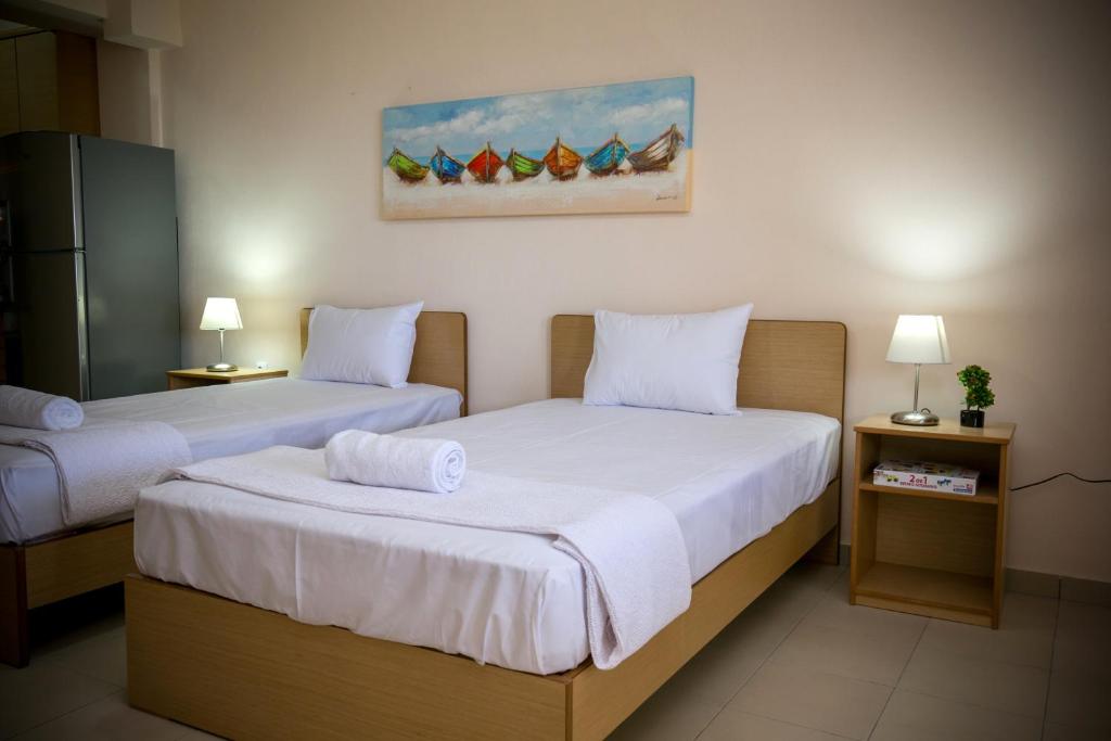 Voodi või voodid majutusasutuse Aphrodite Villas toas