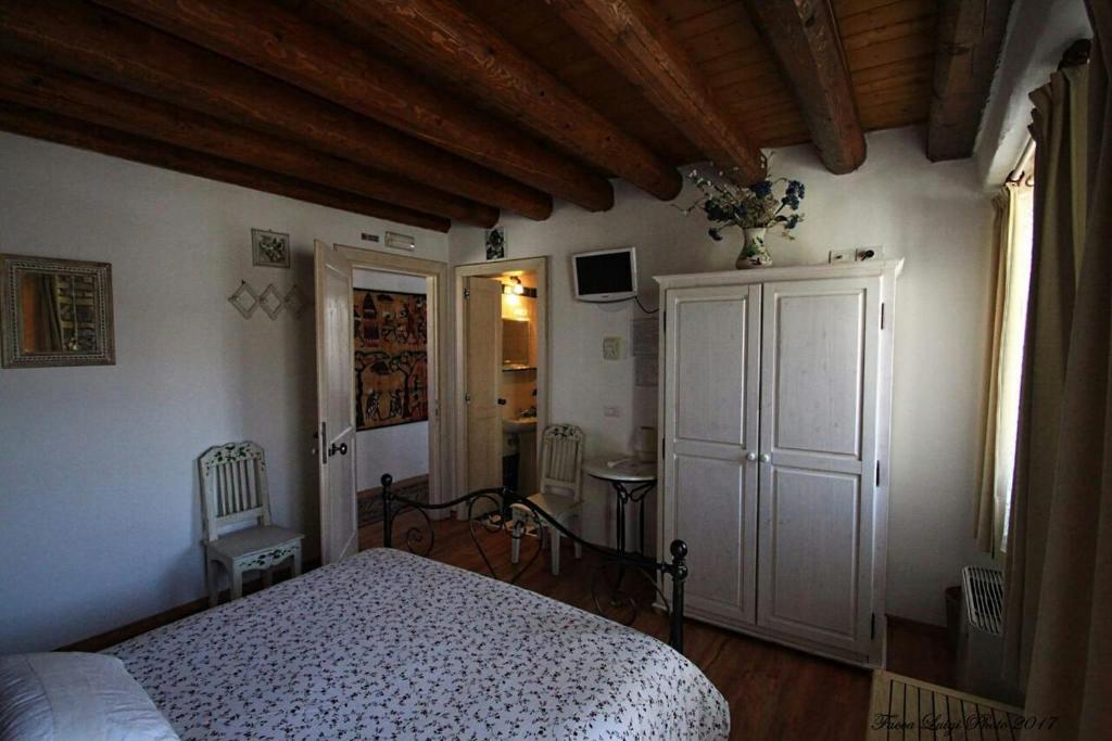 Postel nebo postele na pokoji v ubytování Albergo Julienne