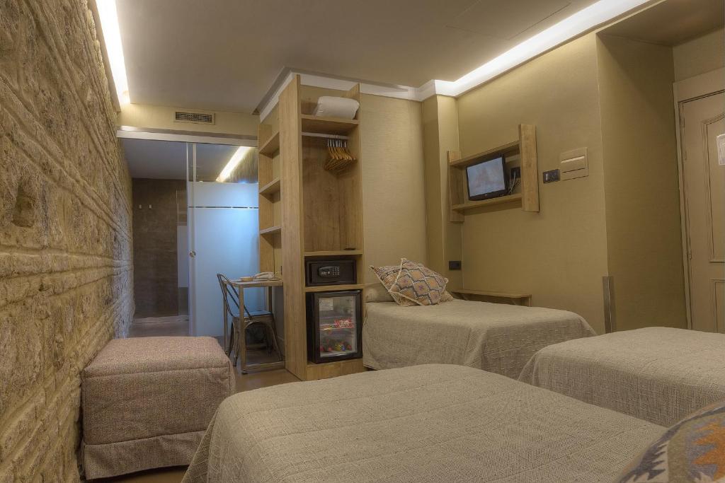 Postel nebo postele na pokoji v ubytování Los Patios
