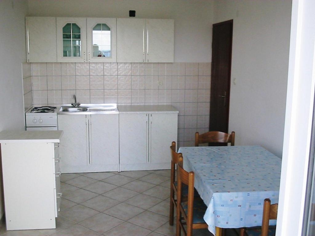 Kuchyň nebo kuchyňský kout v ubytování Apartments Selez