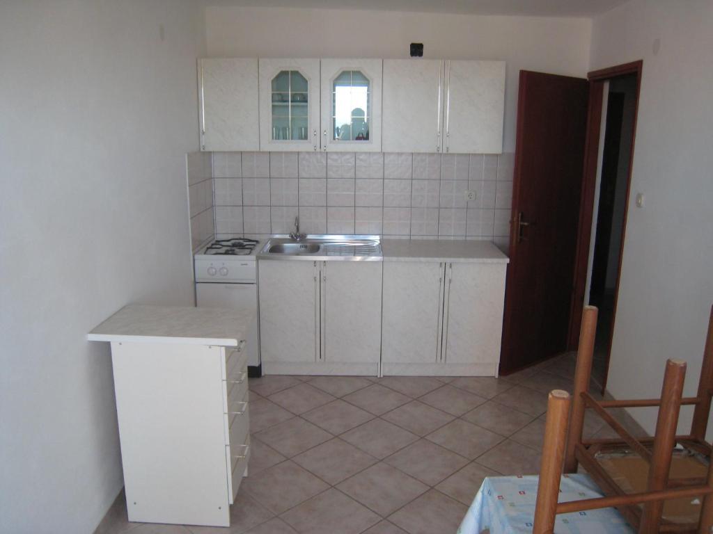 Kuchyň nebo kuchyňský kout v ubytování Apartments Selez
