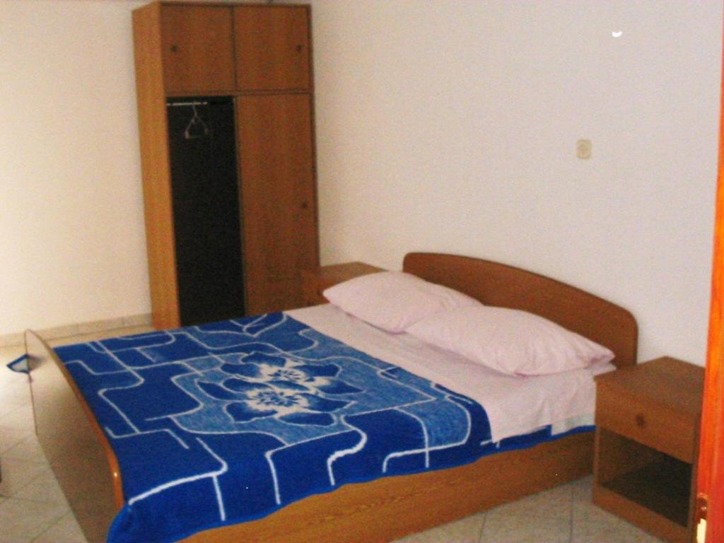 Postel nebo postele na pokoji v ubytování Apartments Selez