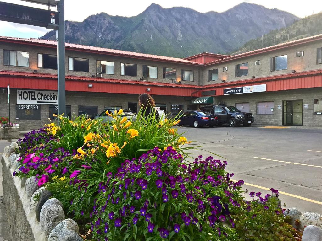 a bunch of flowers in front of a hotel at Hotel Deoro in Lillooet