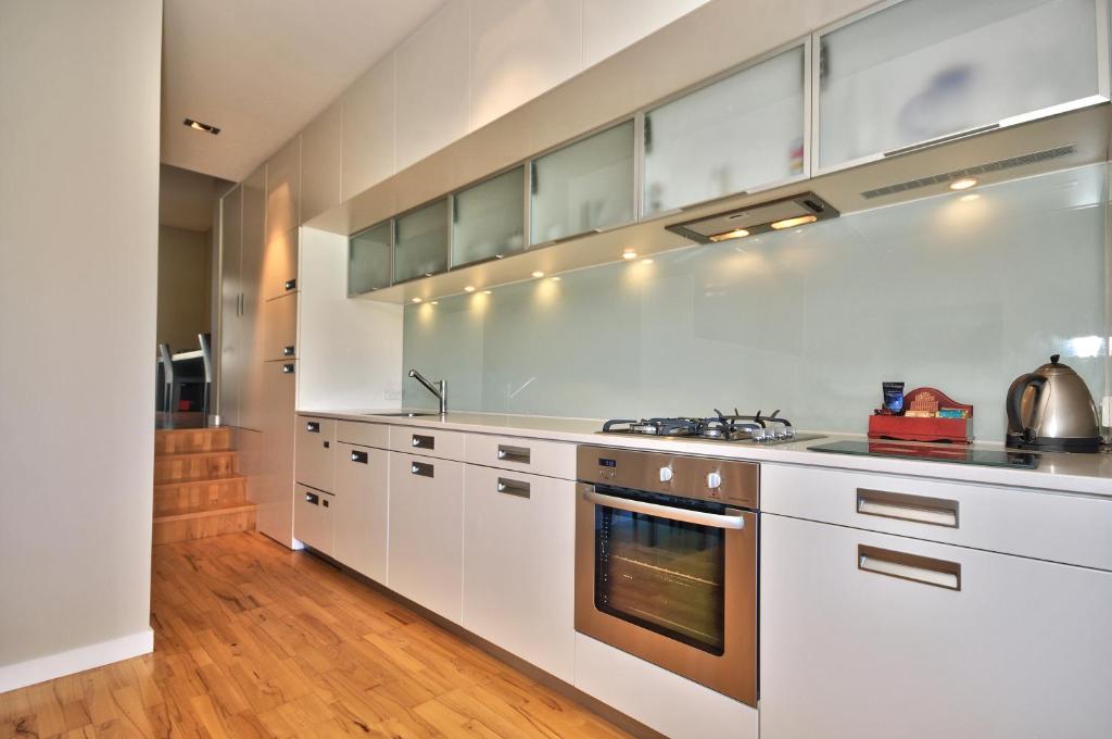 Kuchyň nebo kuchyňský kout v ubytování Swiss-Belsuites Pounamu Queenstown