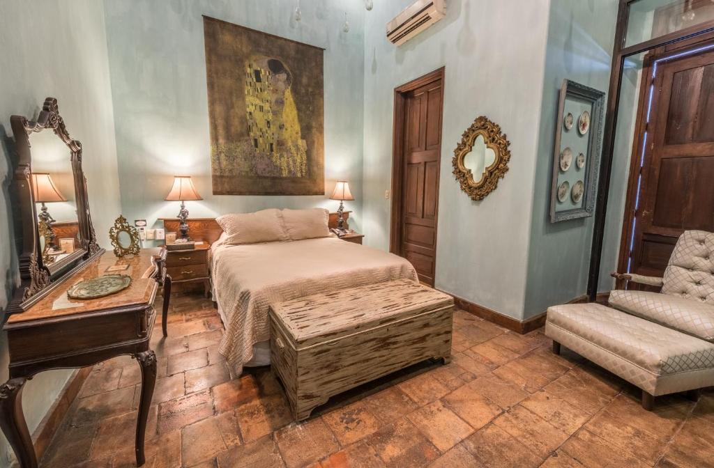 Postel nebo postele na pokoji v ubytování Casa Pedro Loza