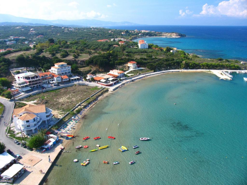 an aerial view of a beach with boats in the water at Corali Beach in Tsilivi