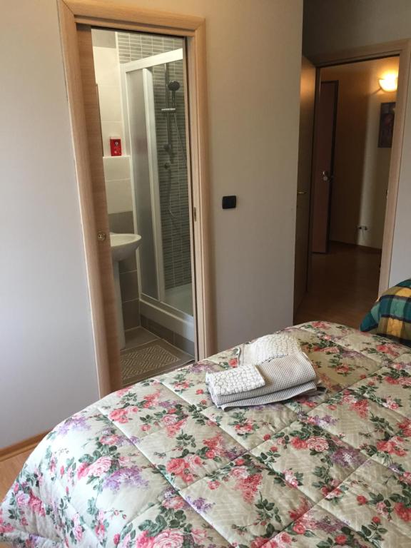 Łóżko lub łóżka w pokoju w obiekcie B&B Iris