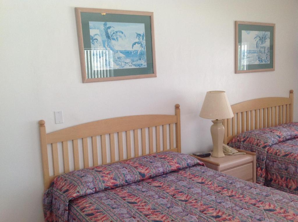 Postel nebo postele na pokoji v ubytování Birch Patio Motel