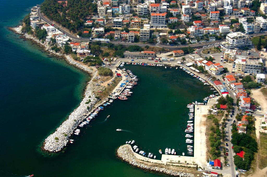 an aerial view of a harbor with boats in the water at Olena House in Kavala