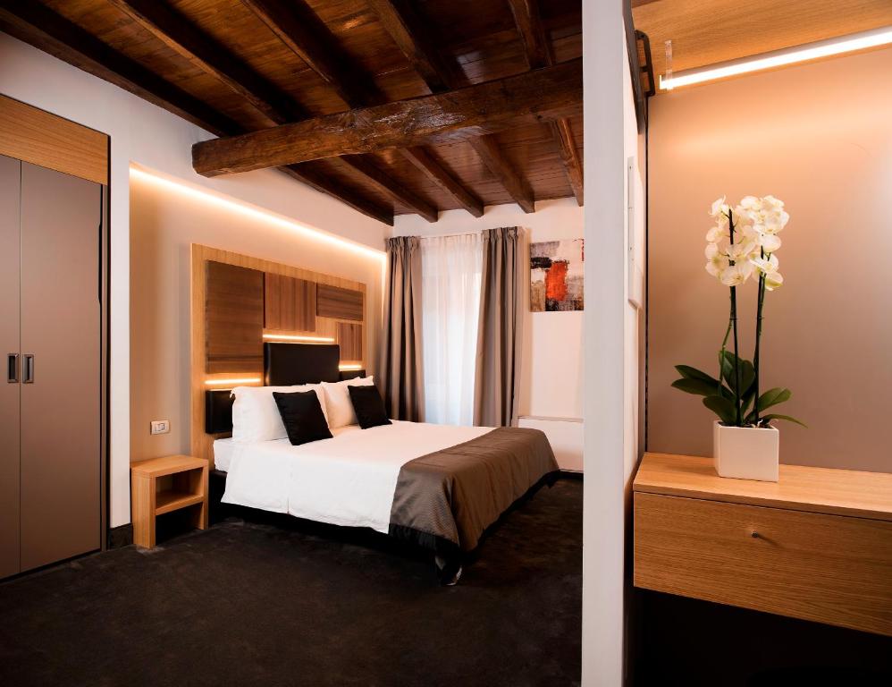 Postel nebo postele na pokoji v ubytování Hotel Trevi - Gruppo Trevi Hotels