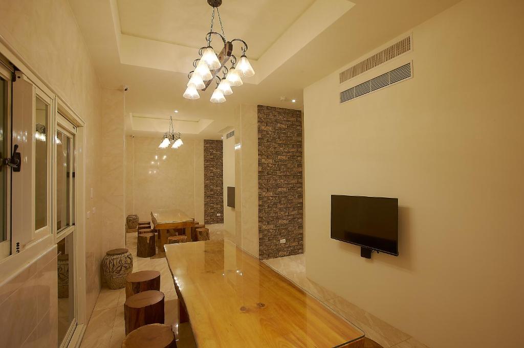 TV a/nebo společenská místnost v ubytování 大鵬灣瞭望台 Top Bay B&B