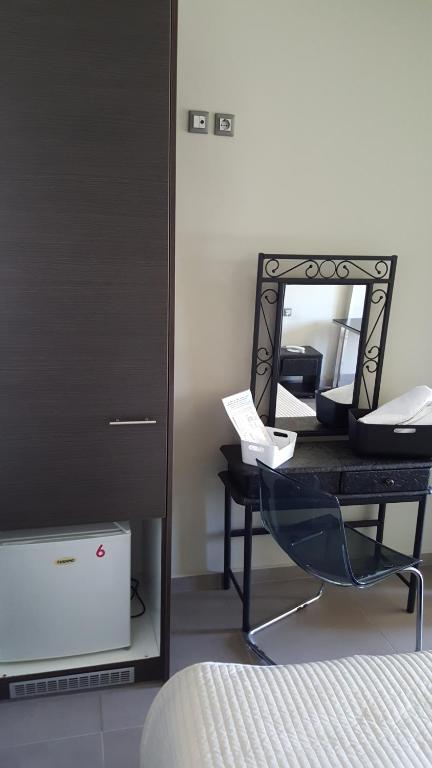 TV a/nebo společenská místnost v ubytování Argolis Hotel