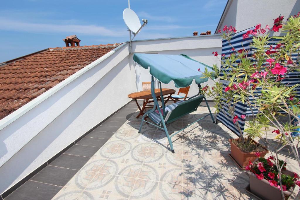 Balkon lub taras w obiekcie Rooms and Apartments Sally