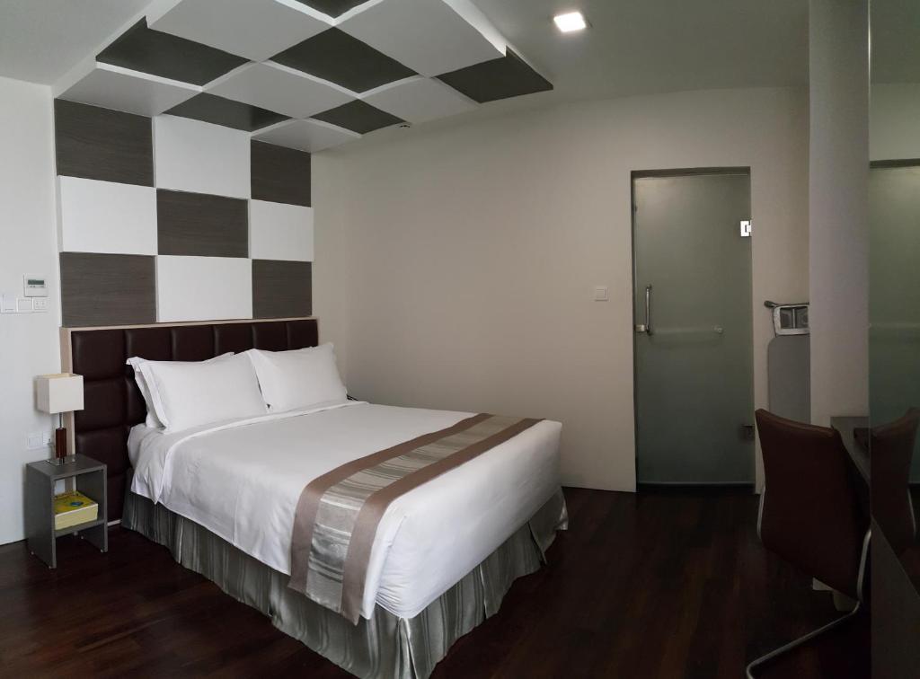 Postel nebo postele na pokoji v ubytování Hotel Parami