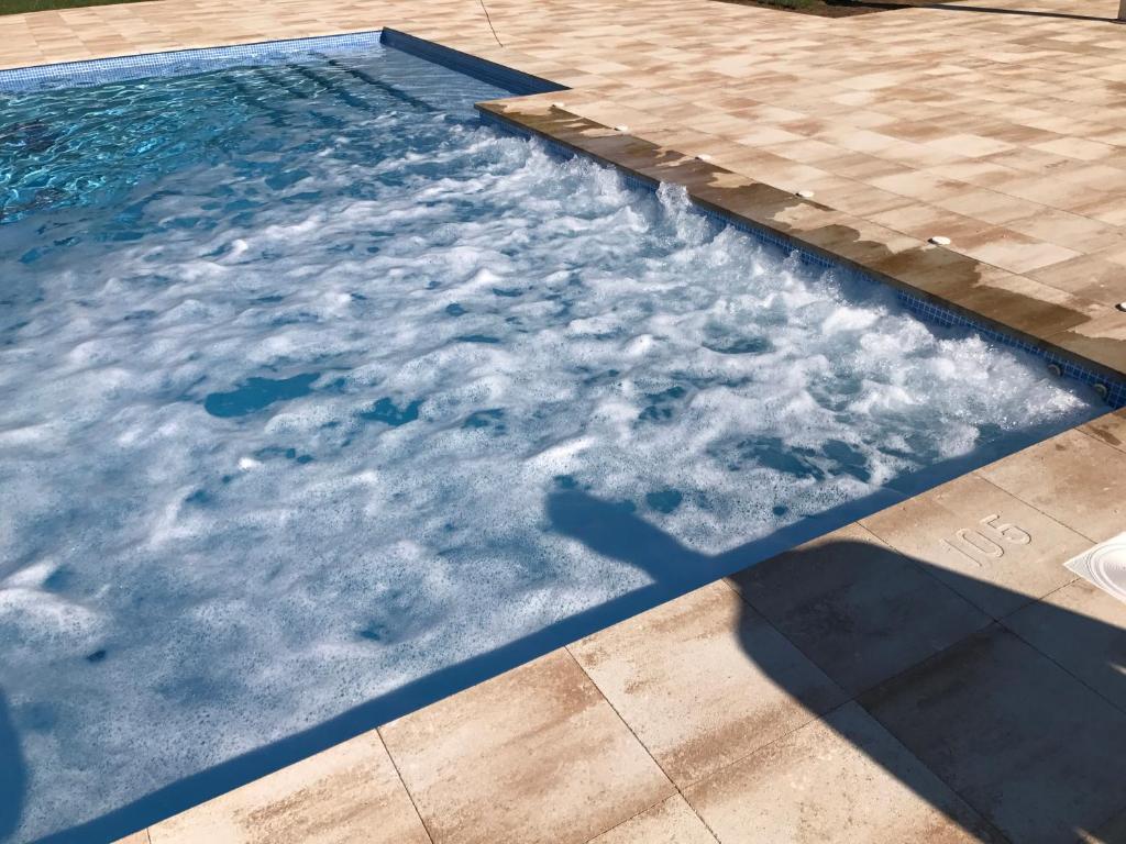 Bazén v ubytování Camping Castell D'aro nebo v jeho okolí