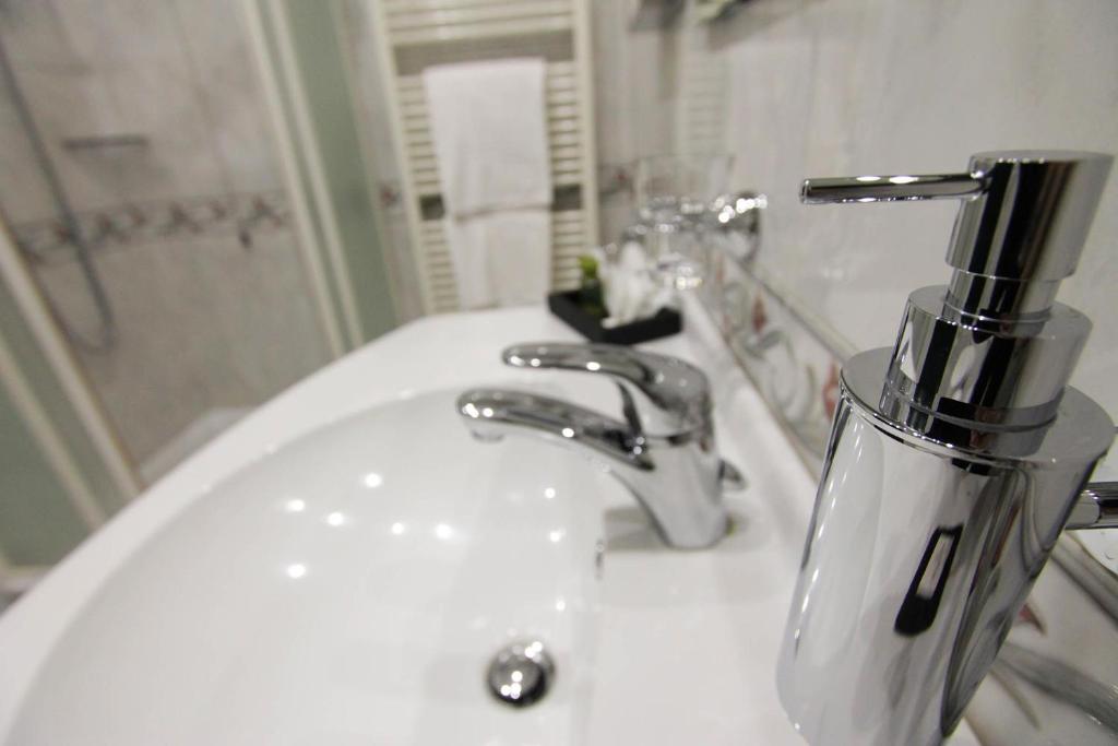 Koupelna v ubytování Hotel Europa