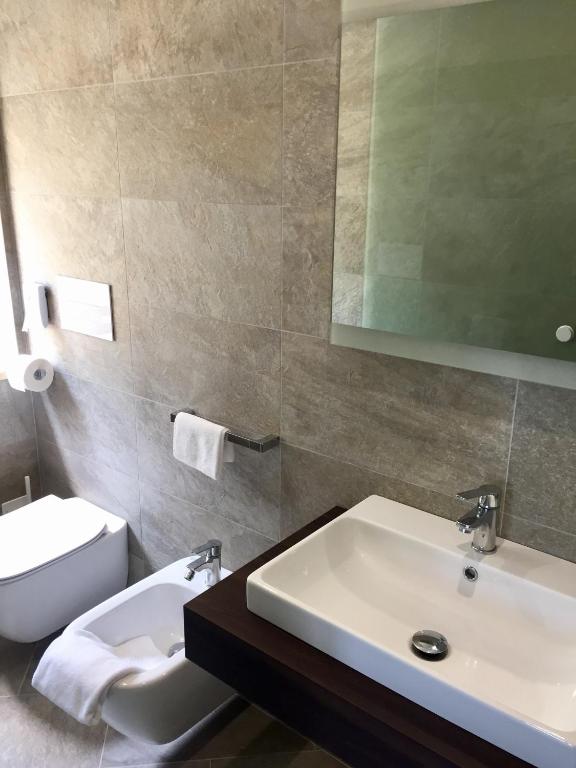 Koupelna v ubytování Hotel Mercedes