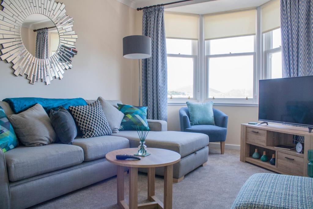 TV a/nebo společenská místnost v ubytování Lexington Apartments