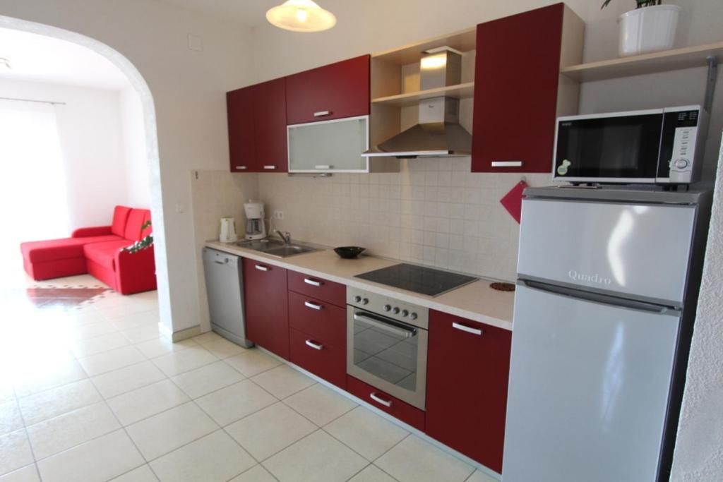 Køkken eller tekøkken på Apartments Mauro