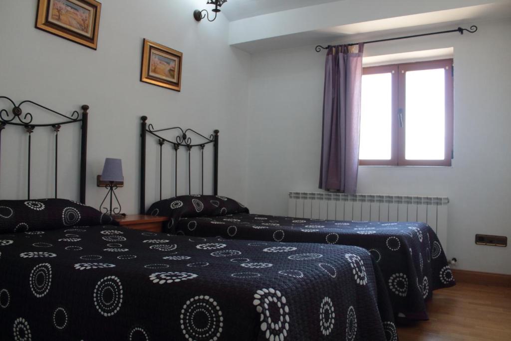 Cama o camas de una habitación en El Diezmo