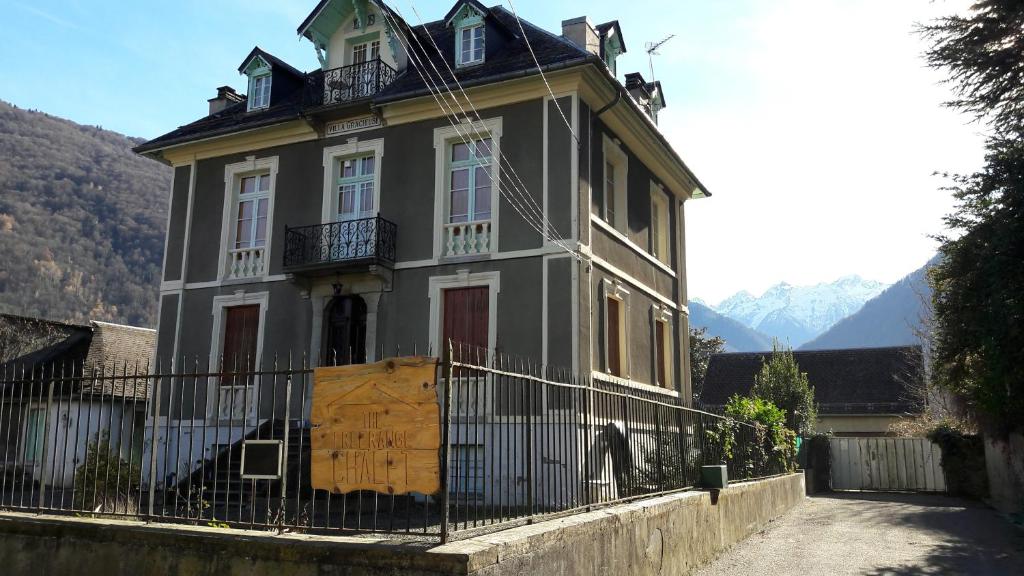 a large house with a fence in front of it at Villa Gracieuse in Luchon