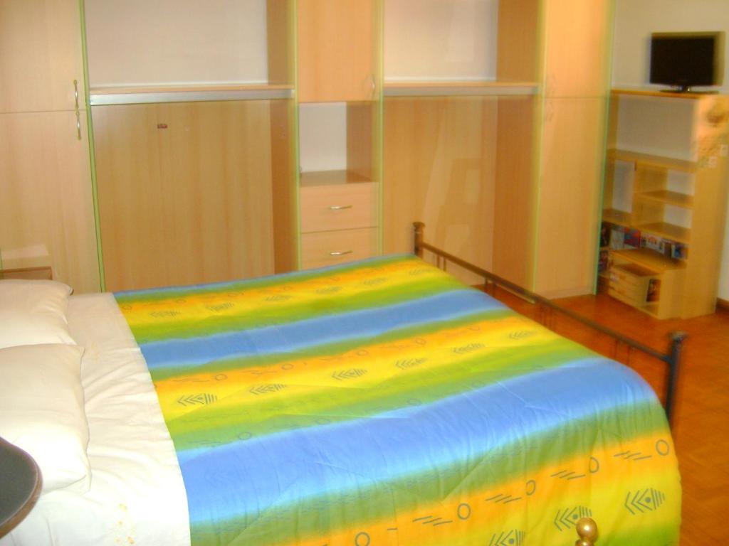 Postel nebo postele na pokoji v ubytování B&B La Mimosa