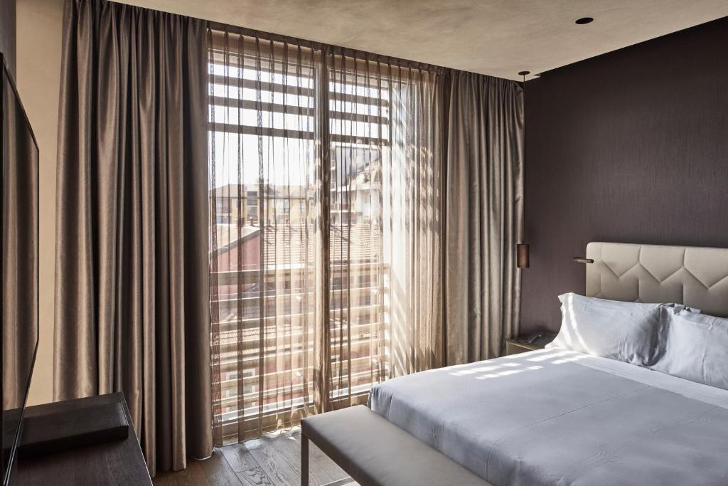 Postel nebo postele na pokoji v ubytování Hotel VIU Milan, a Member of Design Hotels