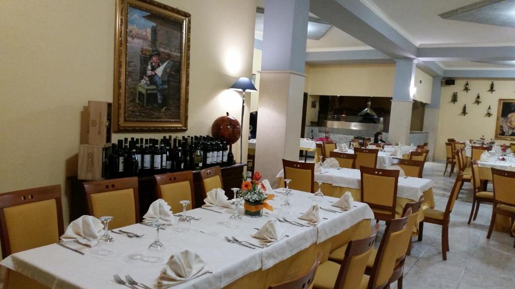 A restaurant or other place to eat at Albergo B&B Antica Trattoria Bacco
