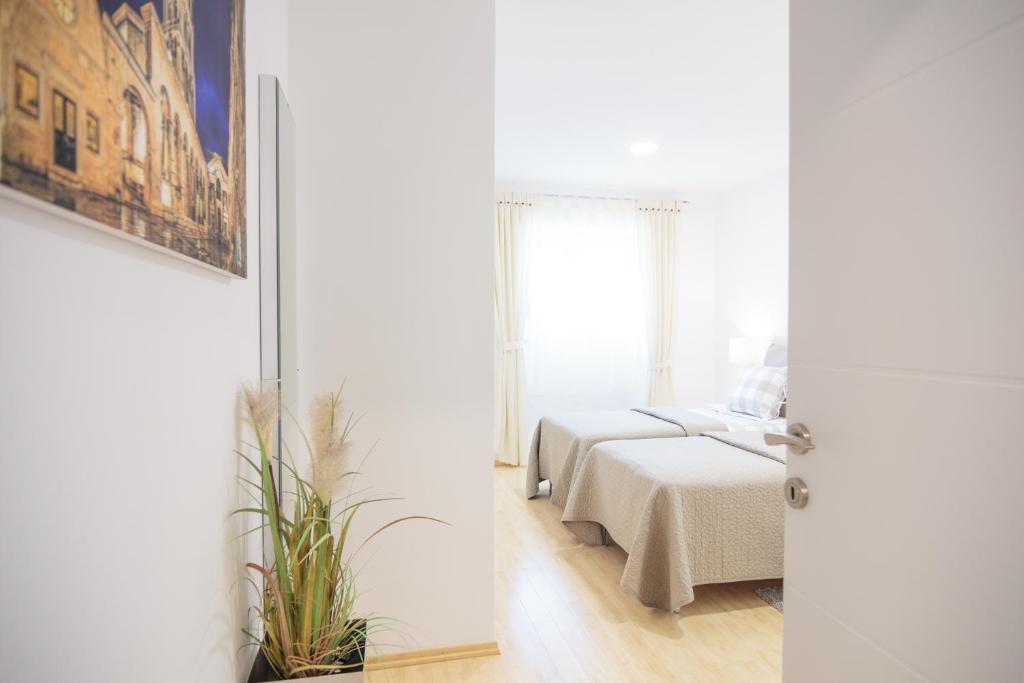 Posteľ alebo postele v izbe v ubytovaní Holiday Home Aspalathos - with free parking, near the beach, a few minutes' walking distance to the UNESCO Palace