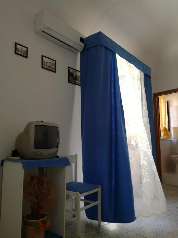 Telewizja i/lub zestaw kina domowego w obiekcie Sotto L'Arco