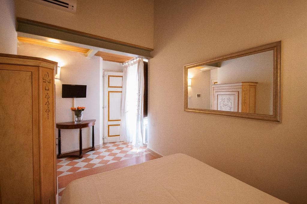 Postel nebo postele na pokoji v ubytování A Casa Mastacchi