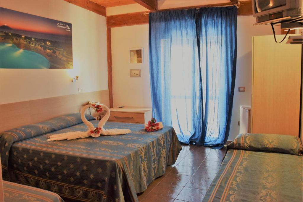 Posteľ alebo postele v izbe v ubytovaní Hotel Orizzonte Blu