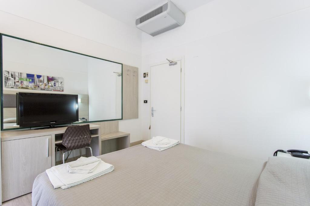 TV a/nebo společenská místnost v ubytování Hotel Tiberius