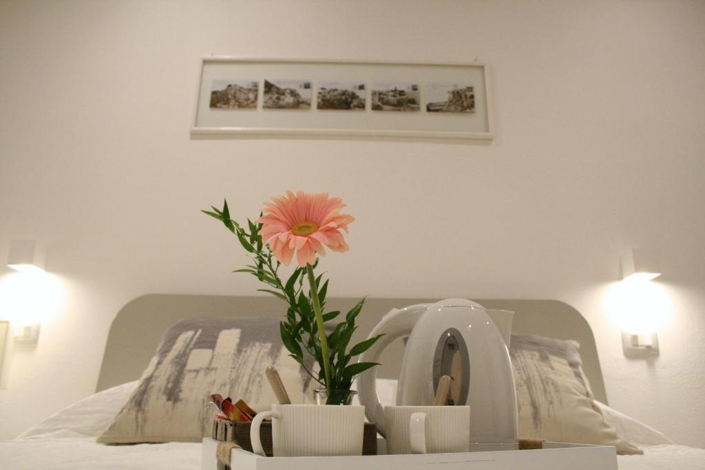 Voodi või voodid majutusasutuse Real Rooms toas