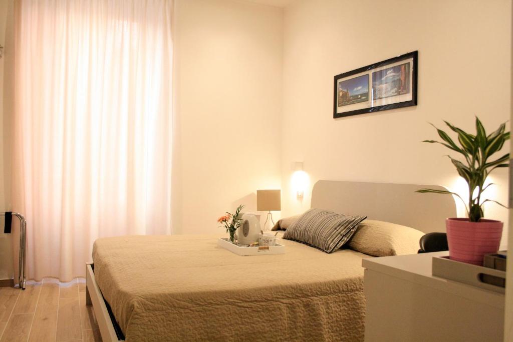Voodi või voodid majutusasutuse Real Rooms toas