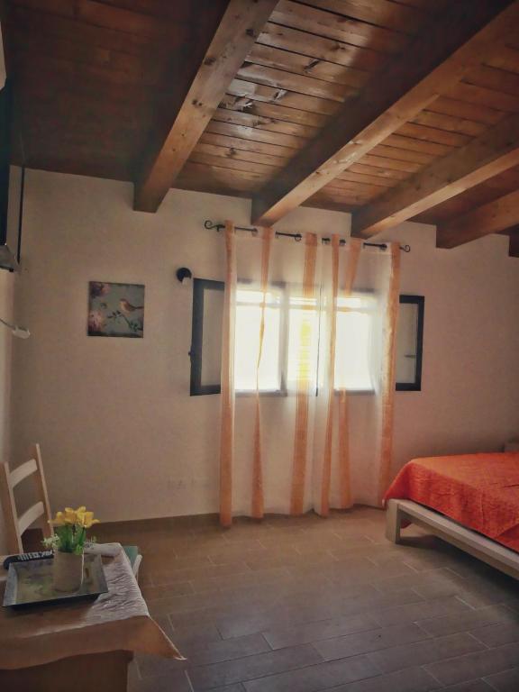 Postel nebo postele na pokoji v ubytování Gelsomino B&B