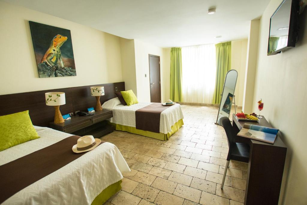 TV a/nebo společenská místnost v ubytování Hotel Isla Sol by Solymar