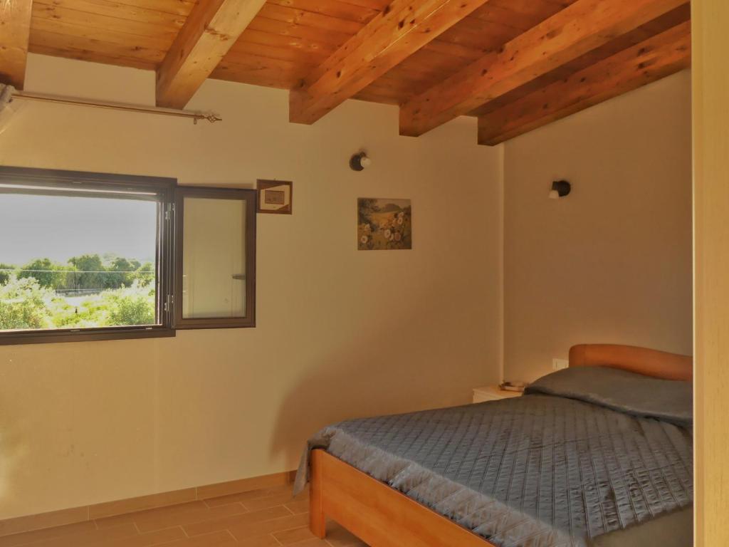 Postel nebo postele na pokoji v ubytování Gelsomino B&B