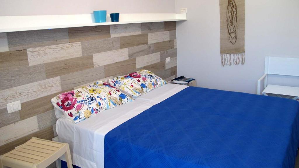 Postel nebo postele na pokoji v ubytování B&B Le Thuje