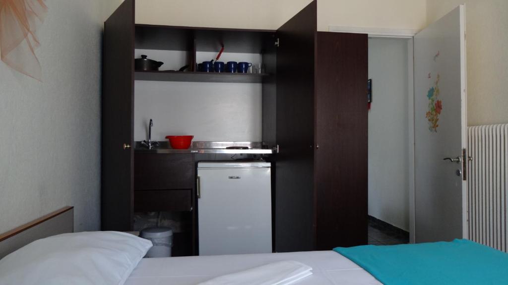Kuchyň nebo kuchyňský kout v ubytování Hotel Dias Apartment