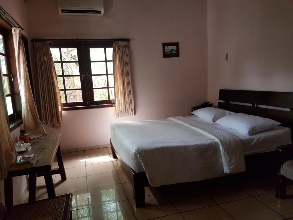 Postel nebo postele na pokoji v ubytování Peye Guesthouse