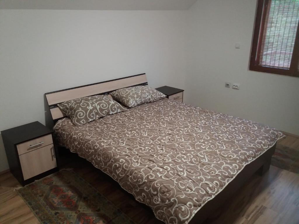 Postel nebo postele na pokoji v ubytování Apartment Sijakovic