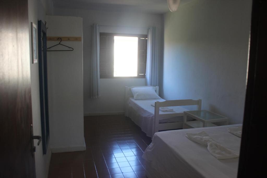 Voodi või voodid majutusasutuse Hostel Luz toas
