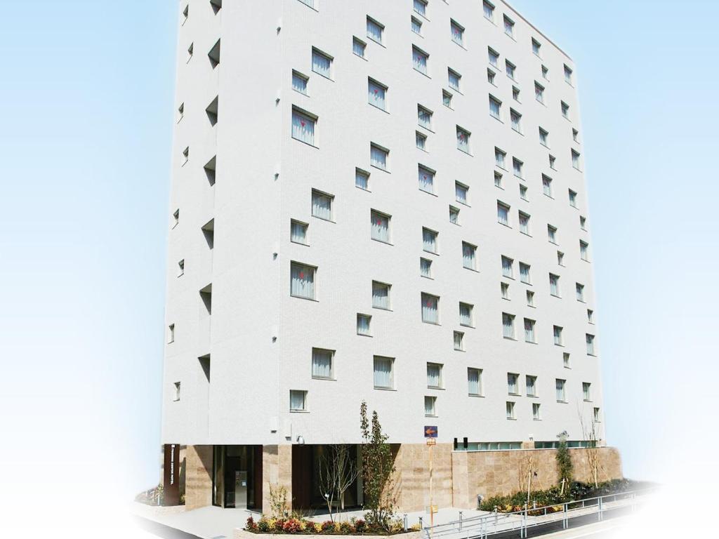 a rendering of a white building at S.Training Center Hotel Osaka in Osaka