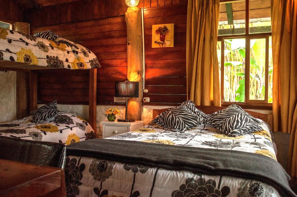 Postel nebo postele na pokoji v ubytování Casa de Piedra