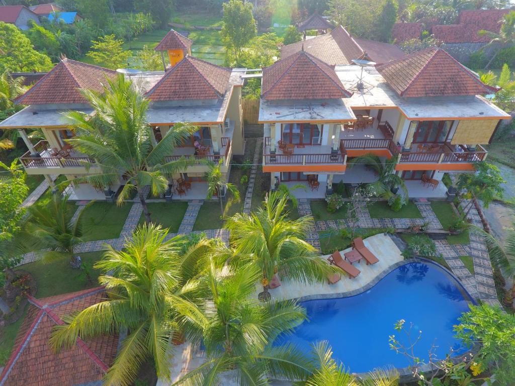 an aerial view of a resort with a swimming pool at Villa Mangga Beach in Amed