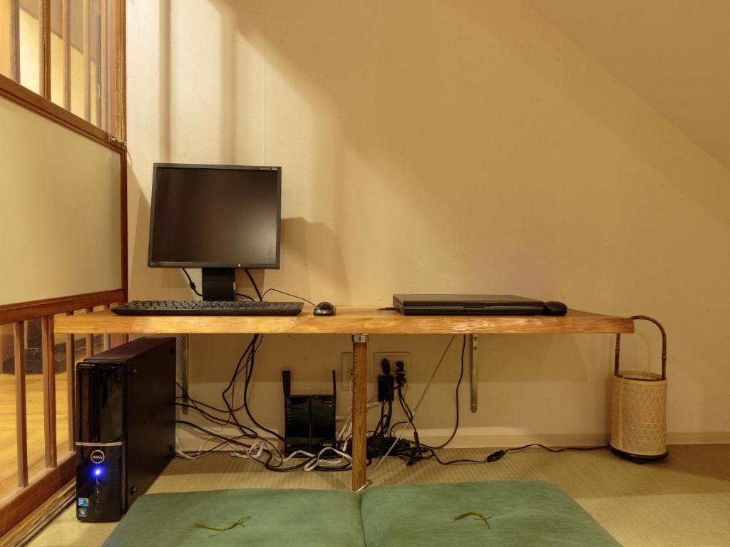 TV a/nebo společenská místnost v ubytování Gion Ryokan Q-beh
